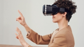 woman using virtual reality goggles